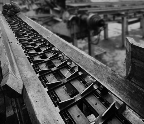 Chaîne mécanique à grume pour bois
